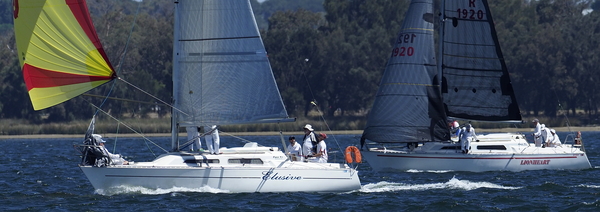 Elusive and Lionheart running downwind, with Elusive in front but slightly to leeward.